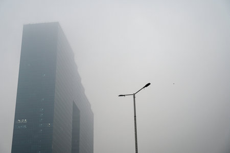 NOIDA, INDIA - DECEMBER 27: Fog seen developed in the city amid heavy rainfall on December 27, 2024 in Noida, India. Delhi and nearby areas received moderate to heavy rain on Friday, leading to a drop in temperatures. The India Meteorological Department (のeditorial素材