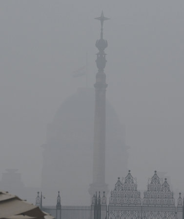 NEW DELHI, INDIA - DECEMBER 27: National flag flies at half-mast at the President house, as one-week state mourning is being observed in the country as a mark of respect to former Prime Minister Manmohan singh on December 27, 2024 in New Delhi, India. Forのeditorial素材