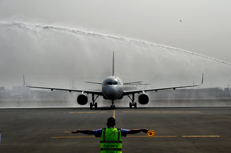 NAVI MUMBAI, INDIA - DECEMBER 29: First commercial aircraft landing on the runway of Navi Mumbai...