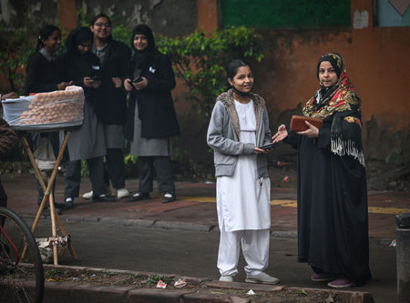 NEW DELHI, INDIA - DECEMBER 29: Students seen along with their parents as a Mega PTM is organized in all Delhi Government School at DDU Marg ion December 29, 2024 in New Delhi, India. North India is reeling under cold weather with temperatures plummeting のeditorial素材