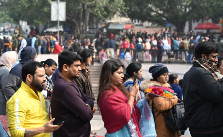 NEW DELHI, INDIA - JANUARY 1: Devotees in long queue wait to pay obeisance at the Hanuman Mandir on the first day of the year 2025, at Connaught Place on January 1, 2024 in New Delhi, India. (Photo by Arvind Yadav/Hindustan Times )のeditorial素材