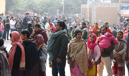 NEW DELHI, INDIA - JANUARY 1: Devotees wait to pay obeisance at the Hanuman Mandir on the first day...
