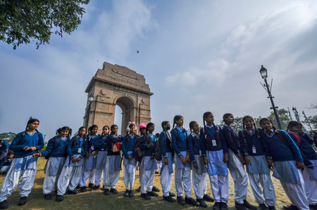 NEW DELHI, INDIA - DECEMBER 30: School students enjoy India gate during the Clean and cold Afternoon...