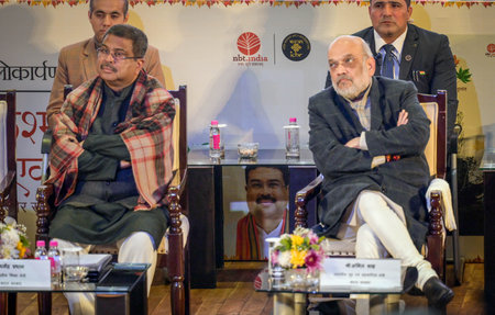 NEW DELHI, INDIA - JANUARY 2:  Home minister Amit shah along with Dharmendra Pradhan Minister of Education of India during the book releasing of âJammu Kashmir & Ladakh through the Agesâ at Ambedkar international center  on January 2, 2025 in New Delhのeditorial素材