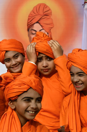KOLKATA, INDIA - JANUARY 12: Students dressed as Swamiji participate in a walk celebrating Swami Vivekananda's 162nd birth anniversary at Salt Lake Central Park, on January 12, 2025 in Kolkata, India. Swami Vivekanand Jayanti is observed every year on Janのeditorial素材
