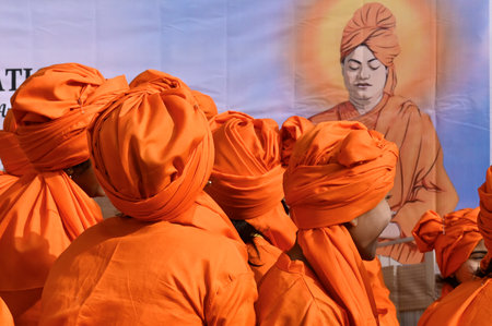 KOLKATA, INDIA - JANUARY 12: Students dressed as Swamiji participate in a walk celebrating Swami...