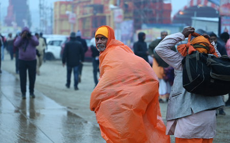 PRAYAGRAJ, INDIA - JANUARY 12: Devotees arrive at Mahakumbh Nagar to take dip into Sangam on January 12, 2025 in Prayagraj, India. The next Maha Kumbh Mela will take place in Prayagraj from January 13 to February 26, 2025. The festival is expected to attrのeditorial素材