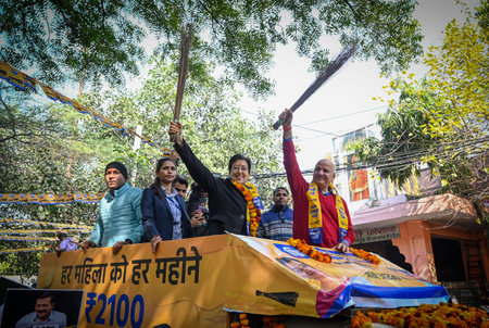 NEW DELHI INDIA JANUARY 13 2025 Atishi Candidate from Kalkaji Constituency for upcoming Vidhan Sabha Elections from Aam Admi Party seen along with AAP leader Manish Sisodia during a road show while on her way towards filing the Nominations papers at Kalkaのeditorial素材