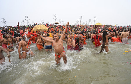 PRAYAGRAJ INDIA JANUARY 14 2025 Seers and Saints take holy dip at Sangam on the occasion of Makar Sankranti the confluence of the Ganges Yamuna and Saraswati rivers during the Maha Kumbh Mela on January 14 2025 in Prayagraj India The mega spiritual festivのeditorial素材