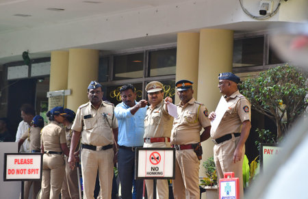 MUMBAI INDIA JANUARY 16 2025 Police personnel stand outside Lilavati hospital where Bollywood actor...