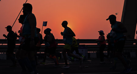 MUMBAI, INDIA - JANUARY 19: Runners participating in the 2025 Tata Mumbai Marathon, running on the Worli-Bandra Sea Link, on January 19, 2025 in Mumbai, India. The Mumbai Marathon is a World Athletics Gold Label Race and it sees people from India and abroのeditorial素材
