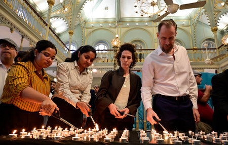 MUMBAI INDIA JANUARY 27 2025 The followers of Jewish community and dignitaries pays respects to the victims of the holocaust on International Holocaust Remembrance Day of commemorative event at Kenneseth Eliyahoo Synagogue on January 27 2025 in Mumbai Indのeditorial素材