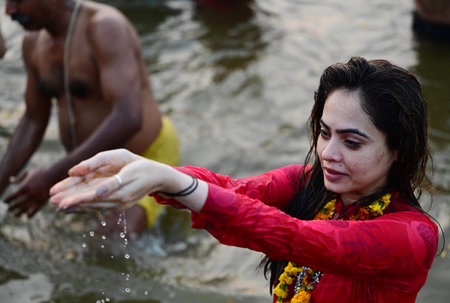PRAYAGRAJ, INDIA - FEBRUARY 3: Female Sanyasini taking a holy dip during the third ' Amrit bath' on the occasion of Basant Panchami at Triveni Sangam on February 3, 2025 in Prayagraj, India. (Photo by Deepak Gupta/Hindustan Times )のeditorial素材
