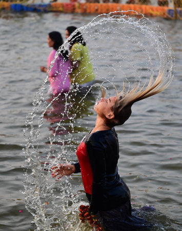 PRAYAGRAJ, INDIA - FEBRUARY 3: Foreign DevoteeÂ taking a holy dip during the third ' Amrit bath' on the occasion of Basant Panchami at Triveni Sangam on February 3, 2025 in Prayagraj, India. (Photo by Deepak Gupta/Hindustan Times )のeditorial素材