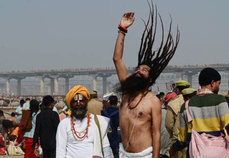 PRAYAGRAJ, INDIA - JANUARY 29: A sadhu drying his hair after taking a holy dip in the Sangam on the occasion of 'Mauni Amavasya' during the Mahakumbh on January 29, 2025 in Prayagraj, India. (Photo by Deepak Gupta/Hindustan Times )のeditorial素材