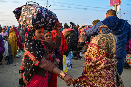 PRAYAGRAJ, INDIA - JANUARY 28: Hindu Devotees arrive to take a holy dip at sangam on the Maha Kumbh Mela, on January 28, 2025 in Prayagraj, India. (Photo by Salman Ali/Hindustan Times )のeditorial素材