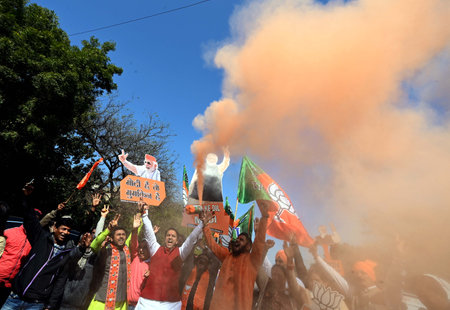 NEW DELHI, INDIA - FEBRUARY 8: Bharatiya Janata Party (BJP) supporters celebrate the party's win in the Delhi Assembly elections at Delhi BJP office on February 8, 2025 in New Delhi, India. The BJP is set to form the government after 27 years and remove tのeditorial素材