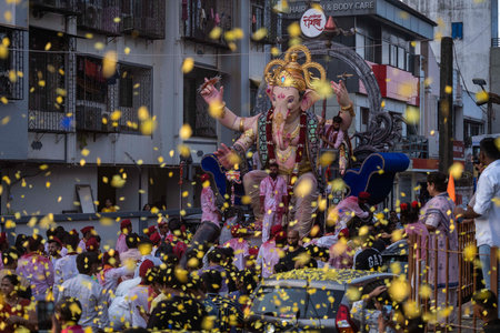 MUMBAI INDIA FEBRUARY 11 2025 Devotees take the Maghi Ganpati of Charkopâs Peshwai Mandal for immersion in sea on February 11 2025 in Mumbai India The Bombay high courtâs January 30 interim order that no Plaster of Paris POP idol should be immersed inのeditorial素材