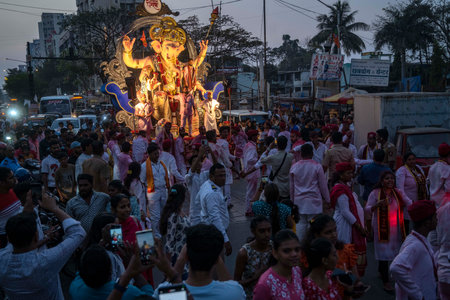 MUMBAI INDIA FEBRUARY 11 2025 Devotees take the Maghi Ganpati of Charkopâs Peshwai Mandal for immersion in sea on February 11 2025 in Mumbai India The Bombay high courtâs January 30 interim order that no Plaster of Paris POP idol should be immersed inのeditorial素材