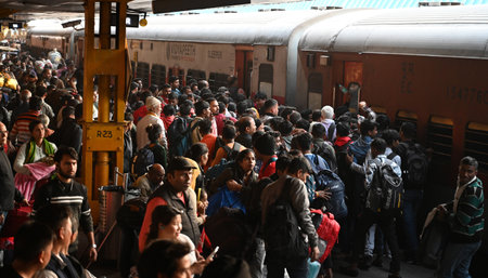 NEW DELHI INDIA FEBRUARY 11 2025 Heavy rush in New Delhi railway station passenger going to Prayagraj for attending Kumbh Mela on February 11 2025 in New Delhi India 20 million people are expected to take dip in Ganga at Prayagraj Mahakumbh on occasion ofのeditorial素材