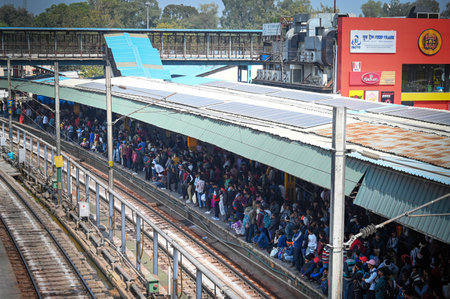 NEW DELHI, INDIA - FEBRUARY 16: Massive crowds of people seen boarding or deboarding the trains at...