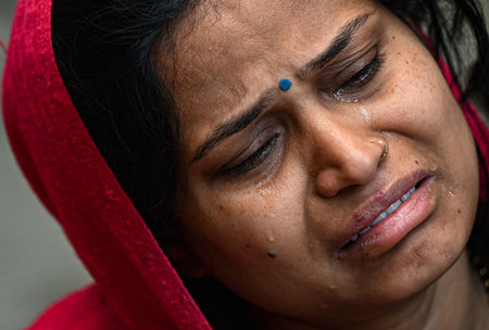 NEW DELHI, INDIA - FEBRUARY 16: Family members of Pinki Devi (who died) in grief at residence near Sangam Vihar, after New Delhi Railway station stampede last night, on February 16, 2025 in New Delhi, India. At least 18 people were killed and more than a のeditorial素材