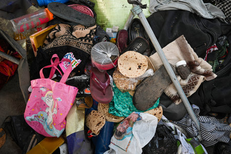 NEW DELHI, INDIA - FEBRUARY 16: Belongings of the passengers seen over the platform where reportedly 18 people died after stampede yesterday at New Delhi Railway Station on February 16, 2025 in New Delhi, India. At least 18 people were killed and more thaのeditorial素材