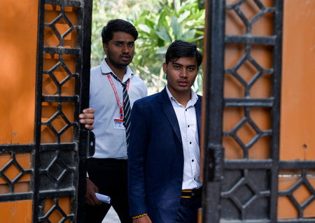 NOIDA, INDIA - FEBRUARY 17: Students exit the examination center after appearing for the Class 12...