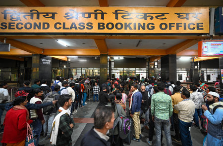 NEW DELHI, INDIA - FEBRUARY 17: Long queues of Passengers seen to buy Tickets after the Railways...