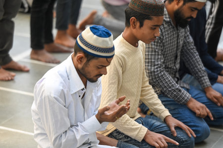 NOIDA, INDIA - MARCH 2: Muslim devotees offer First day Namaz in the holy month of Ramadan at the Sector 8 Jama Masjid, on March 2, 2025 in Noida, India. The sacred month of Ramadan is observed with devotion by Muslims worldwide. The start of the holy monのeditorial素材