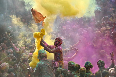 MATHURA, INDIA - MARCH 9: People smear each other with coloured powder Gulal during the Lathmar Holi festival, at Nandji Temple, on March 9, 2025 in Mathura, India. (Photo by Raj K Raj/Hindustan Times )のeditorial素材