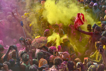 MATHURA, INDIA - MARCH 9: People smear each other with coloured powder Gulal during the Lathmar Holi festival, at Nandji Temple, on March 9, 2025 in Mathura, India. (Photo by Raj K Raj/Hindustan Times )のeditorial素材