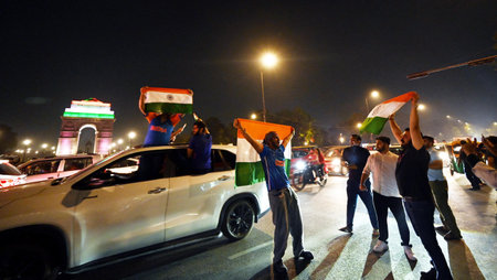 NEW DELHI INDIA MARCH 9 2025 Cricket fans celebrates India winning the ICC Champions Trophy 2025...