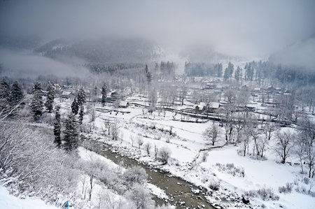 SRINAGAR, INDIA - MARCH 15: A view of a snow covered at Gund village of district Ganderbal, some 90 kms from Srinagar, on March 15, 2025 in Srinagar, India. Many areas in Kashmir, including the plains, received fresh snowfall, while other parts of the Valのeditorial素材