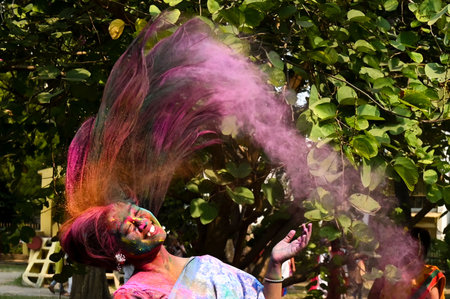 KOLKATA, INDIA - MARCH 14: People applying colors to celebrate the Dol Purnima and Holi, the festival of colors at Golf Green on March 14, 2025 in Kolkata, India. (Photo by Samir Jana/Hindustan Times )のeditorial素材