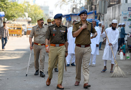 NOIDA, INDIA - MARCH 15: Heavy police force deployed outside Jama Masjid in Sector 8 on the day of Friday namaz, on March 15, 2025 in Noida, India (Photo by Sunil Ghosh/Hindustan Times )のeditorial素材