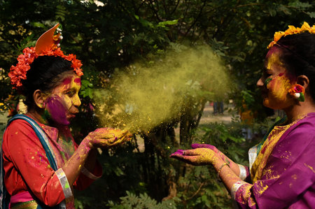 KOLKATA, INDIA - MARCH 14: People applying colors to celebrate the Dol Purnima and Holi, the festival of colors at Golf Green on March 14, 2025 in Kolkata, India. (Photo by Samir Jana/Hindustan Times )のeditorial素材