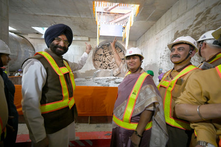 NEW DELHI, INDIA - MARCH 18: Delhi Chief Minister Rekha Gupta along with cabinet minister Manjinder Singh Sirsa and Delhi Metro Rail Corporation (DMRC) employees during the breakthrough of the Tunnel Boring Machine (TBM) at the site of the IGNOU station oのeditorial素材