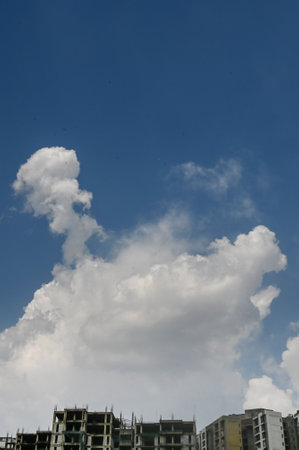 NOIDA, INDIA - MARCH 22: A view of clouds covered the sky in the afternoon, on March 22, 2025 in...