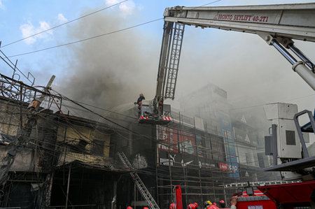 NEW DELHI, INDIA - MARCH 22: Fire broke out at a footwear showroom in Shaheen Bagh main road market, several fire tenders rushed to control the fire, on March 22, 2025 in New Delhi, India. (Photo by Salman Ali/Hindustan Times )のeditorial素材