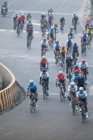 GREATER NOIDA, INDIA - MARCH 23: Over 2,600 cyclists from 24 states participated in the Cyclothon Marathon 2025 organized by HCL, held on a 10 km loop on the Noida-Greater Noida Link Road, on March 23, 2025 in Greater Noida, India. The HCL Cyclothon was oのeditorial素材