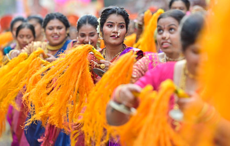 MUMBAI, INDIA - MARCH 30: Women dressed in traditional attire participate in a rally on the occasion of Gudi Padwa,at Girgoan, on March 30, 2025 in Mumbai, India. Gudi Padwa is a significant festival celebrated by Hindus in Maharashtra, and Yugadi in Karnのeditorial素材