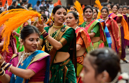 MUMBAI, INDIA - MARCH 30: Women dressed in traditional attire participate in a rally on the occasion of Gudi Padwa,at Girgoan, on March 30, 2025 in Mumbai, India. Gudi Padwa is a significant festival celebrated by Hindus in Maharashtra, and Yugadi in Karnのeditorial素材