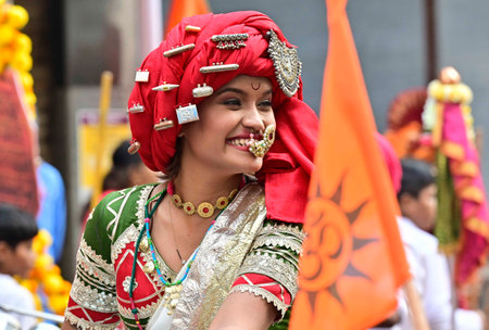 MUMBAI, INDIA - MARCH 30: Women dress up in traditional Maharashtrian attire drive bikes during Gudi Padwa rally on their bikes at Girgoan, on March 30, 2025 in Mumbai, India. Gudi Padwa is a significant festival celebrated by Hindus in Maharashtra, and Yのeditorial素材