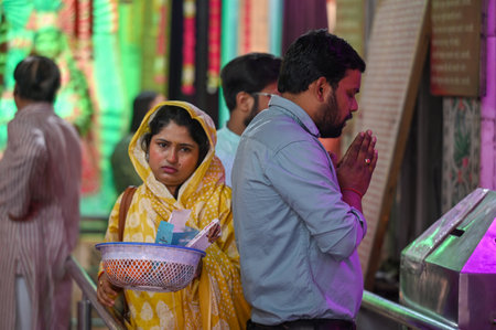 NOIDA, INDIA - MARCH 30: Devotees offer prayers on the first day of Chaitra Navratri festival, at Sanatan Dharm Mandir, Sector 19, on March 30, 2025 in Noida, India. (Photo by Sunil Ghosh/Hindustan Times )のeditorial素材