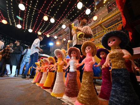 NEW DELHI, INDIA - MARCH 30: People shopping near Jama Masjid market on the eve of Eid-ul-Fitr...
