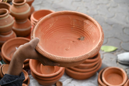 NOIDA, INDIA - MARCH 29: People shop at Sector 12 market a day before the Navratri festival, on March 29, 2025 in Noida, India. Navratri, or nine nights, is a Hindu festival celebrated twice a year in Chaitra (Marchのeditorial素材