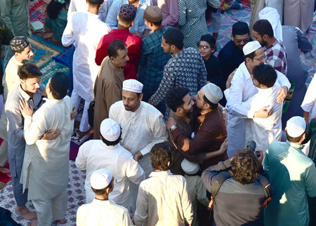 NEW DELHI, INDIA - MARCH 31: Muslims offer prayers at the outside Jama Masjid on the occasion of Eid-ul-Fitr, in Old Delhi, on March 31, 2025 in New Delhi, India. Muslims around the world are getting into the festive Eid spirit as the holy month of Ramadaのeditorial素材