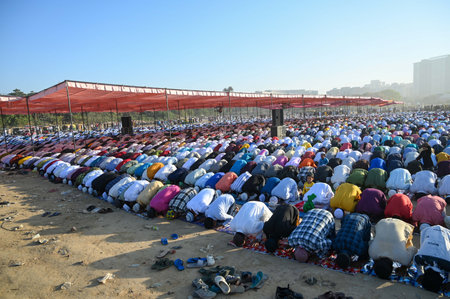 GURUGRAM, INDIA - MARCH 31: Muslims people offer prayers on the occasion of Eid-al-Fitr at a ground in sector-29 near Leisure Valley Park, on March 31, 2025 in Gurugram, India. Muslims around the world are getting into the festive Eid spirit as the holy mのeditorial素材
