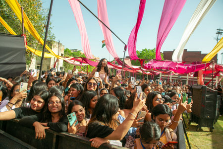NEW DELHI, INDIA - MARCH 28: Crowds enjoy the performance of Singer Prabh Gill during the...